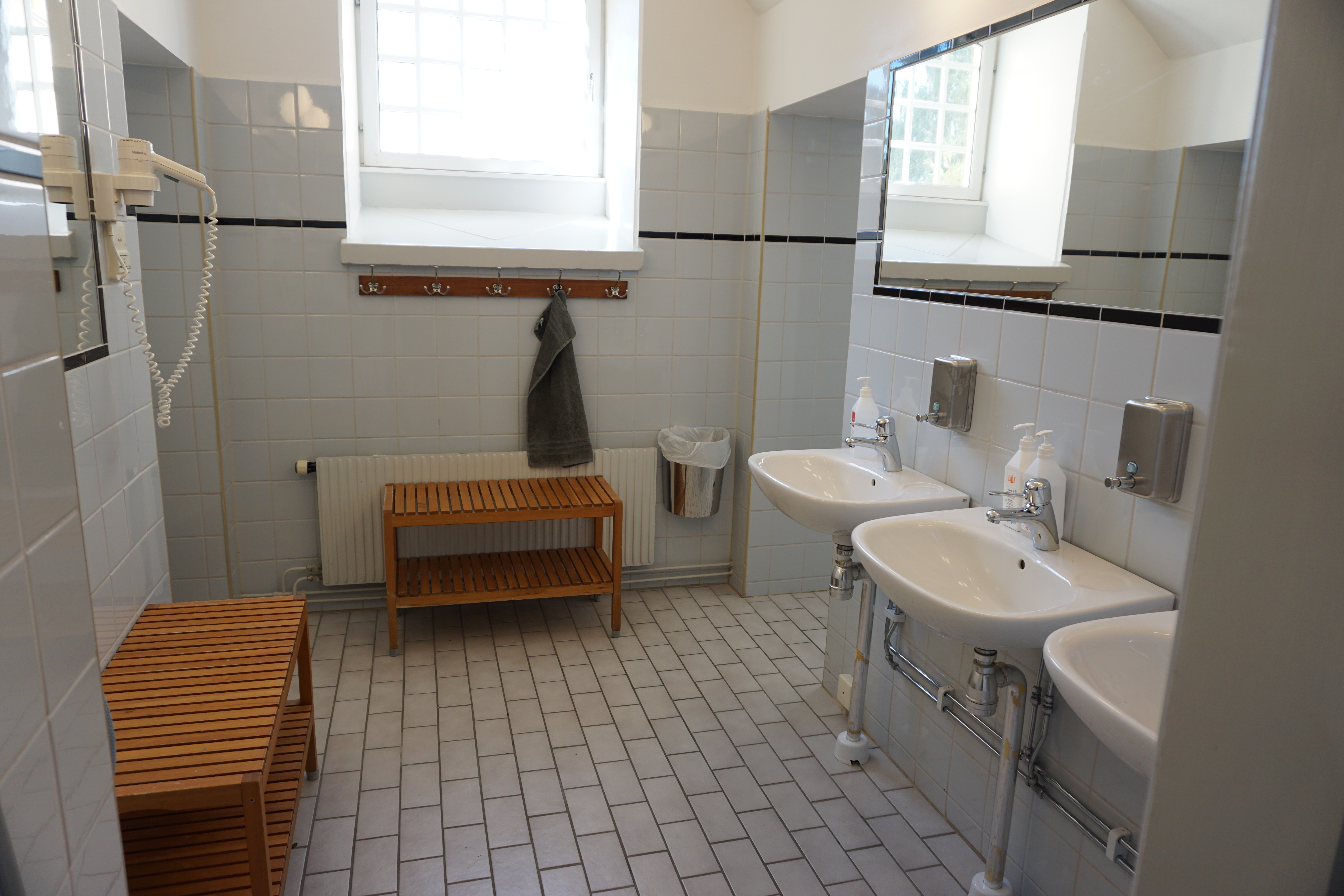 communal shower area at Långholmen hostel
