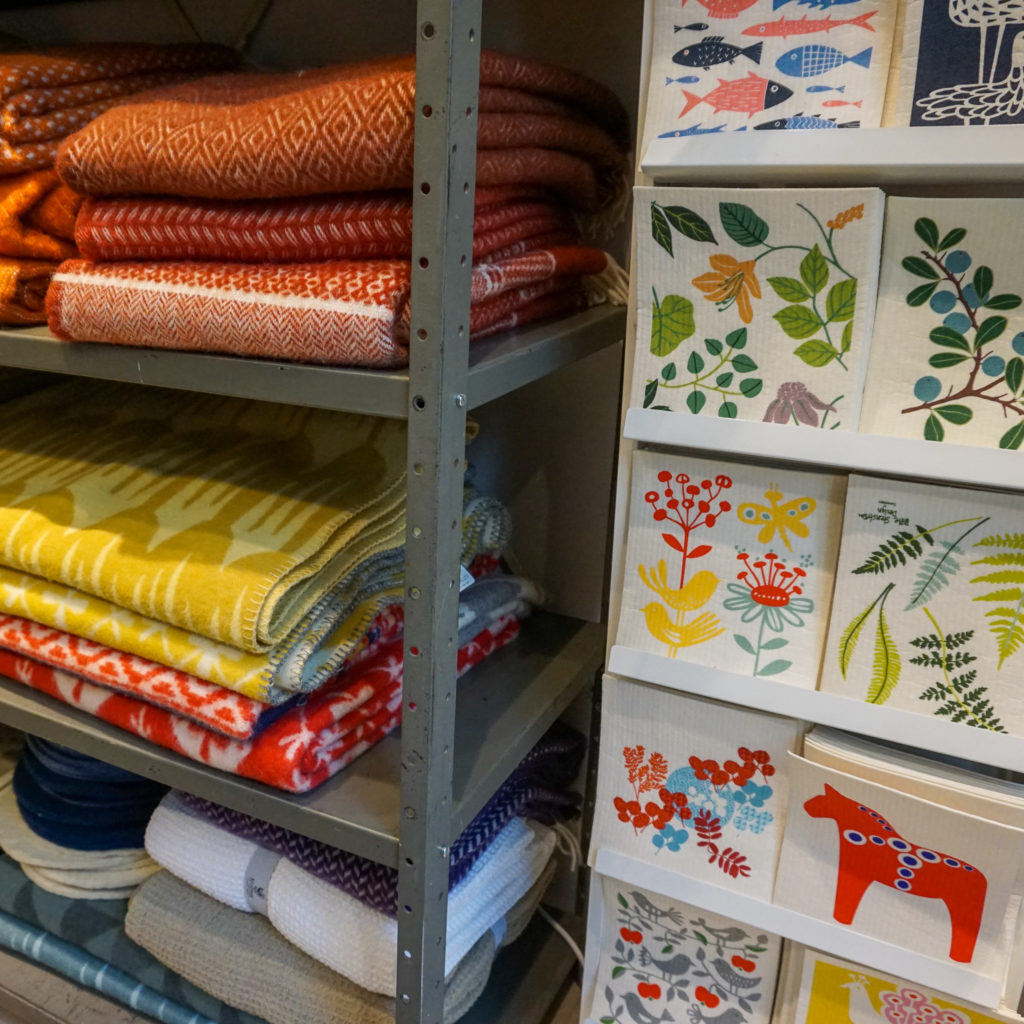 blankets at svensk hemslöjd shop in stockholm for souvenirs